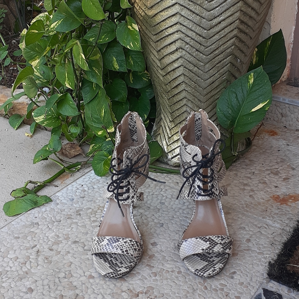 Animal print leather dress sandal.